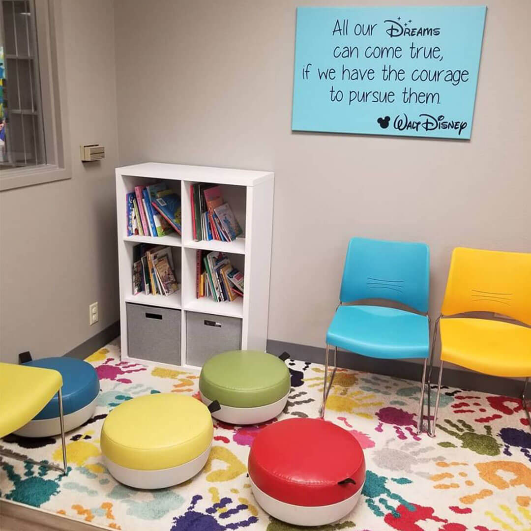Children's waiting area with books.
